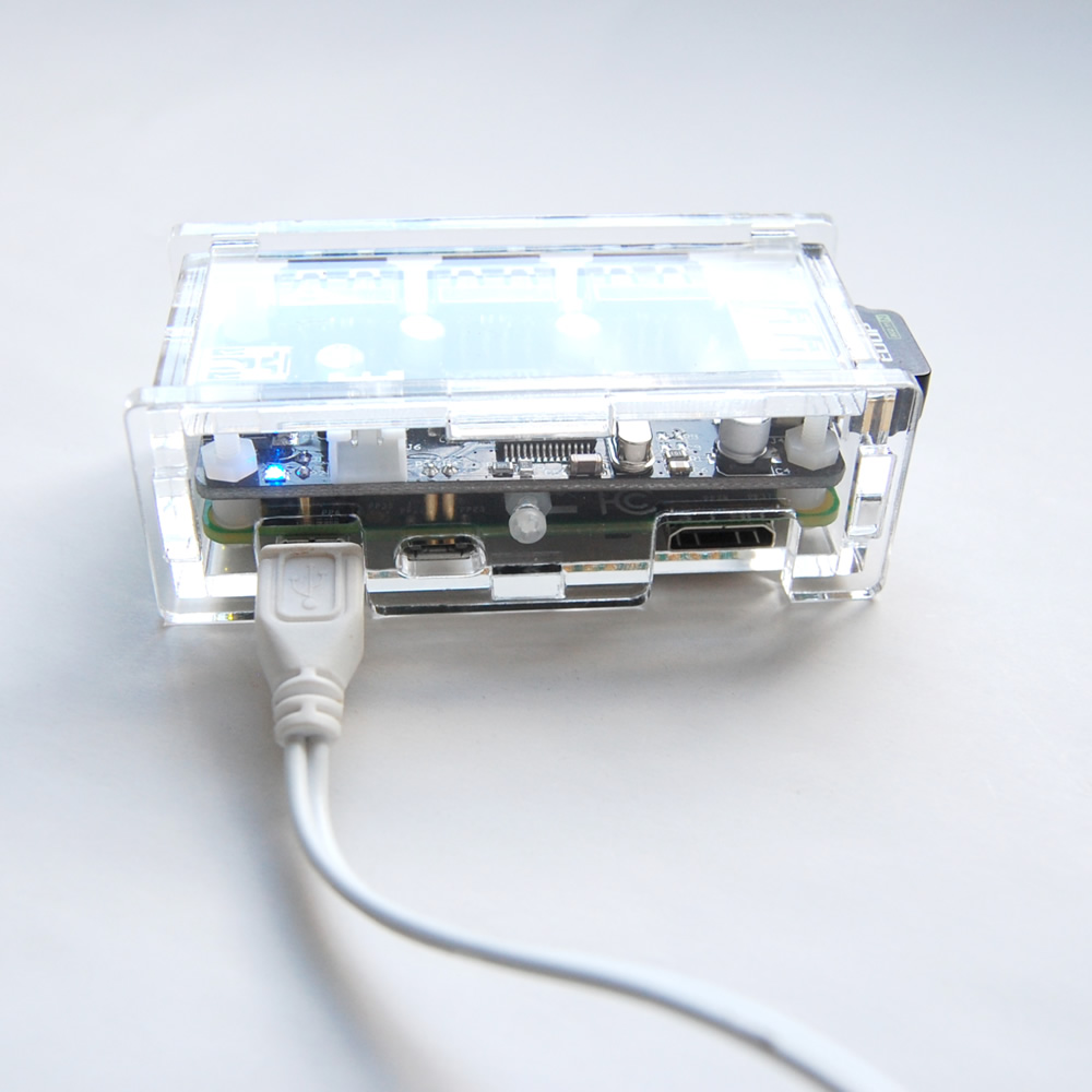 Acrylic case that holds Raspberry Pi Zero and Zero4U